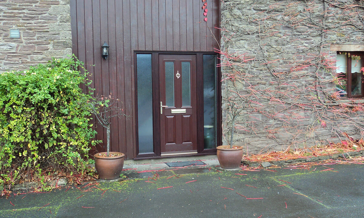 Rosewood composite entrance door with side panels