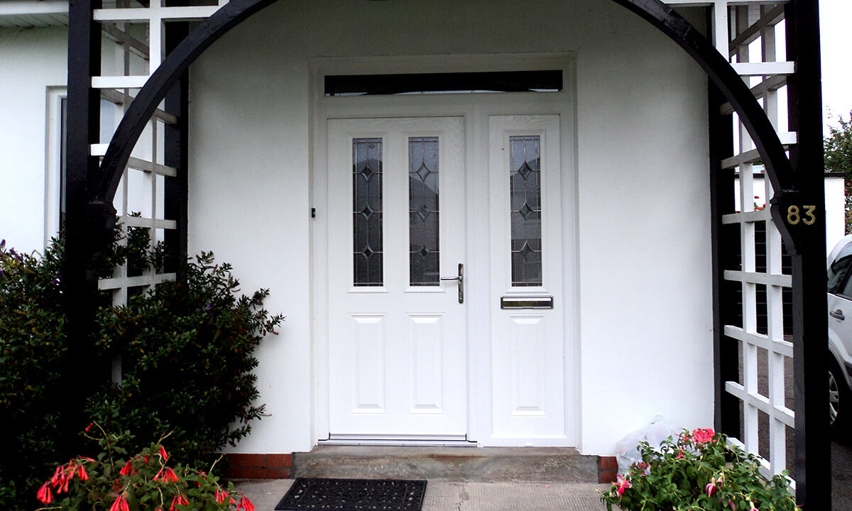 White composite entrance door with a sidepanel