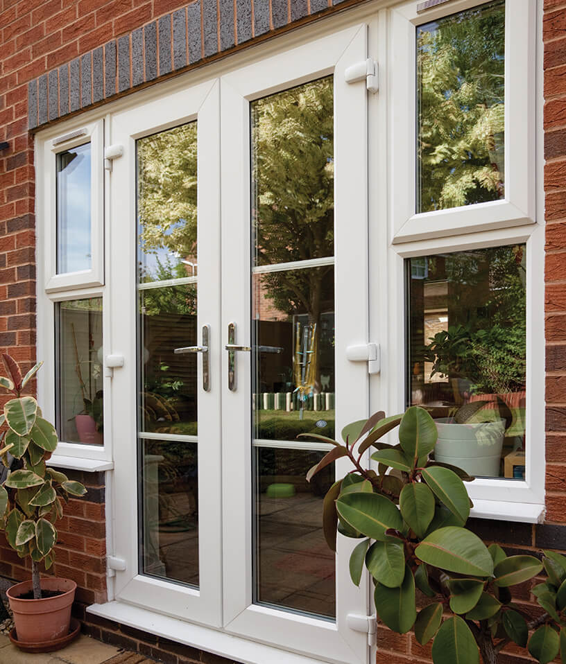 White uPVC french door with side windows