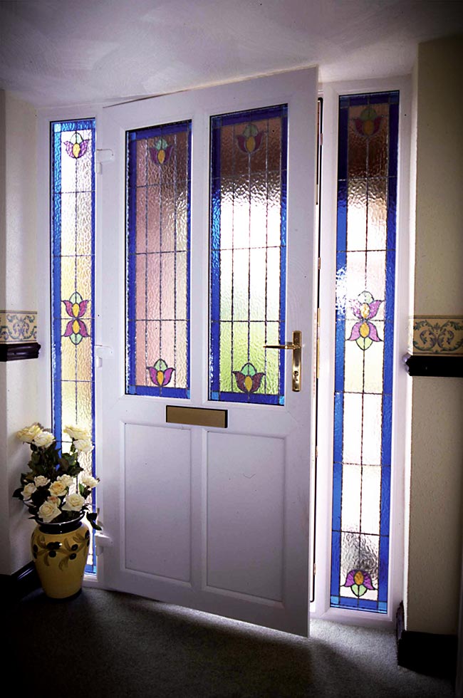 White uPVC entrance door with leaded glass